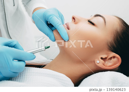 woman having facial injections for facelift and anti-aging effect, close-up face 139140623
