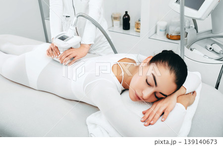 Lpg back massage accelerates the elimination of body fat. The body will be slim and toned after the procedure. Lpg back massage accelerates the elimination of body fat. The body will be slim and toned after the procedure. 139140673