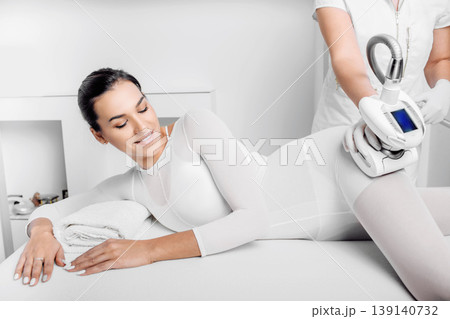 Beautiful woman receiving lpg massage against cellulite 139140732