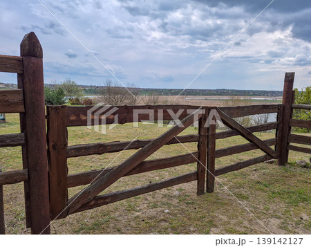 wooden gates made of strong wooden posts and planks 139142127