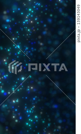 Blue and teal glowing particles drift through a dark space, forming a dreamy abstract field of light with depth and calm motion 139143049