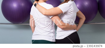 Two women having severe back and neck pain Two women having severe back and neck pain 139143974