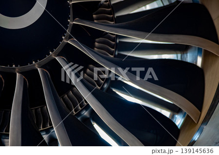 Turbine blades of an aircraft jet engine. Close up Turbines Engine. Aviation Technologies. Aircraft jet black detail during maintenance. Background. Macro. 139145636