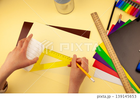 Step 5. Step-by-step instructions on how to make a stand for stationery from recycled materials. Do it yourself. A glass for pencils and pens from a plastic bottle and a can. A fun craft for kids DIY 139145653