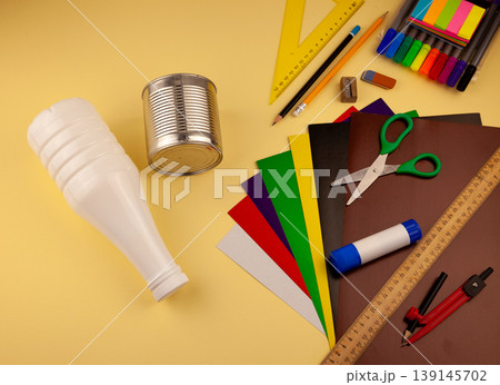 Step 1. Step-by-step instructions on how to make a stand for stationery from recycled materials. Do it yourself. A glass for pencils and pens from a plastic bottle and a can. A fun craft for kids DIY Step 1. Step-by-step instructions on how to make a stand for stationery from recycled materials. Do it yourself. A glass for pencils and pens from a plastic bottle and a can. A fun craft for kids DIY 139145702