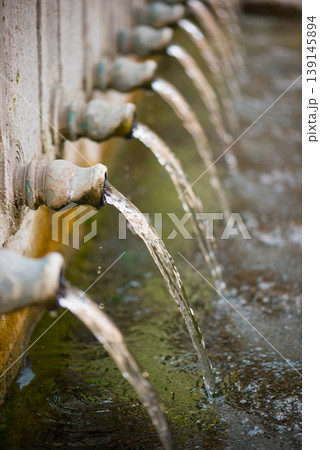 loss of water - the fall of water from water taps loss of water - the fall of water from water taps 139145894
