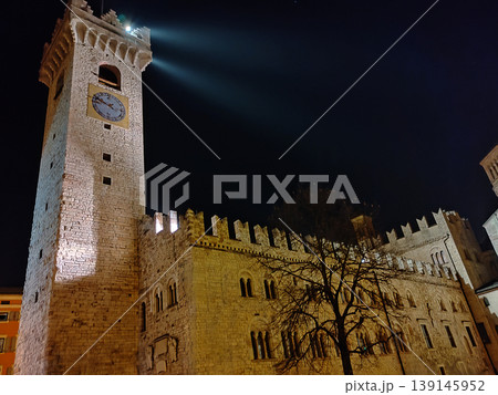 Torre Civica Civic Tower, in Piazza del Duomo, Trento downtown, Trentino-Alto Adige, Italy. Medieval clock tower and roof of the Palazzo Pretorio 139145952