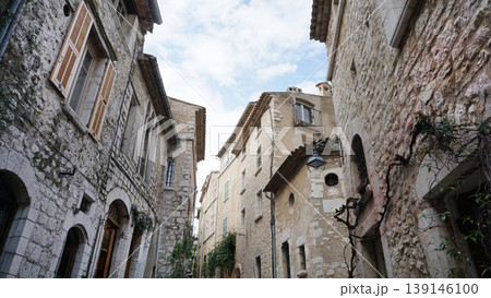 Traditional old stone houses on a street in the medieval town of Saint Paul de Vence, French Riviera, South of France 139146100