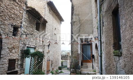 Traditional old stone houses on a street in the medieval town of Saint Paul de Vence, French Riviera, South of France 139146105