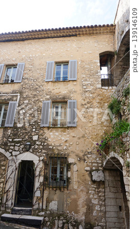 Traditional old stone houses on a street in the medieval town of Saint Paul de Vence, French Riviera, South of France 139146109