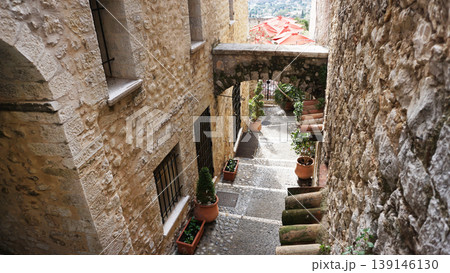 Traditional old stone houses on a street in the medieval town of Saint Paul de Vence, French Riviera, South of France Traditional old stone houses on a street in the medieval town of Saint Paul de Vence, French Riviera, South of France 139146130