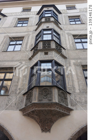 Historic facades at old street of Innsbruck view, alpine city in Tirol, region of Austria Historic facades at old street of Innsbruck view, alpine city in Tirol, region of Austria 139146178