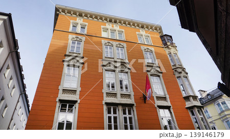 Historic facades at old street of Innsbruck view, alpine city in Tirol, region of Austria 139146179