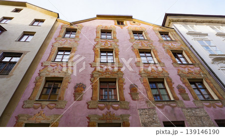 Historic facades at old street of Innsbruck view, alpine city in Tirol, region of Austria Historic facades at old street of Innsbruck view, alpine city in Tirol, region of Austria 139146190