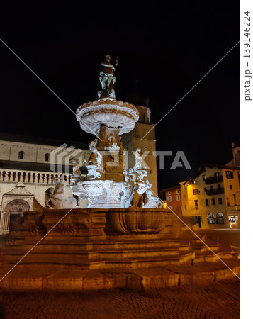 Fontana del Nettuno near Trento Cathedral or Duomo di Trento is a Roman Catholic cathedral in Trento city in Trentino Alto Adige in Italy 139146224