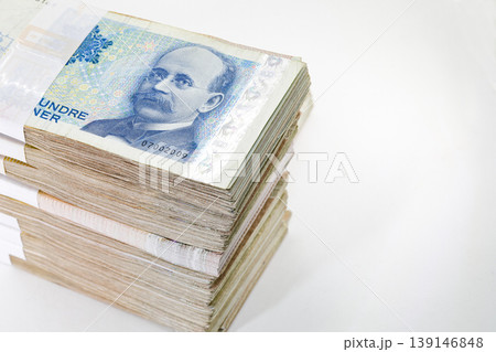 Many packs of Norway krone bills, 200 krone, stacks of banknotes, pile of cash, paper money. The concept of financial success, Investment and wealth. isolate on white background. 139146848