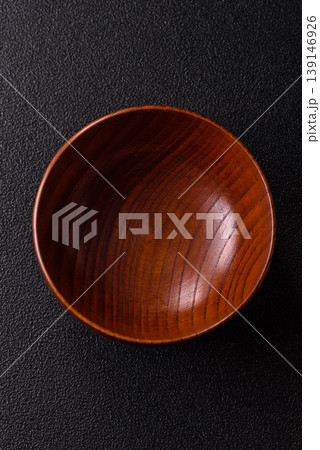 An empty round brown wooden bowl for Asian food. An empty wooden bowl An empty round brown wooden bowl for Asian food. An empty wooden bowl 139146926