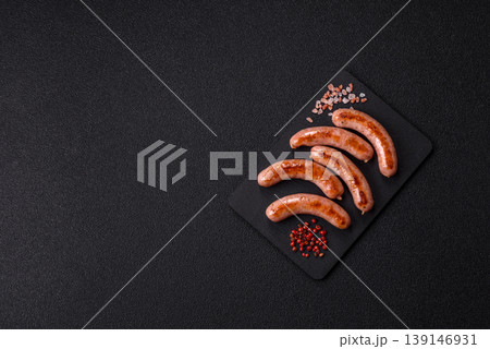 Grilled pork or chicken sausages, smoked fried food with salt and spices. Grilled sausages 139146931