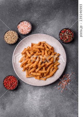 Croutons or crackers made from rye bread with garlic, salt, and spices. Croutons with salt Croutons or crackers made from rye bread with garlic, salt, and spices. Croutons with salt 139146993