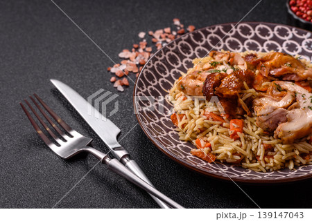Kabsa or mandi, an Arabic dish with rice and chicken, salt, and spices. Kabsa or mandi Kabsa or mandi, an Arabic dish with rice and chicken, salt, and spices. Kabsa or mandi 139147043