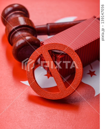 The cargo container ban on the Norwegian flag as a conceptual backdrop. The cargo container embargo The cargo container ban on the Norwegian flag as a conceptual backdrop. The cargo container embargo 139147056
