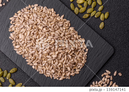 Shelled sunflower seed kernels, salted, roasted, or raw, are a healthy ingredient. Sunflower seeds Shelled sunflower seed kernels, salted, roasted, or raw, are a healthy ingredient. Sunflower seeds 139147141