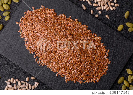 Flaxseed as an ingredient for oil, organic flour, and healthy foods. Flax seeds Flaxseed as an ingredient for oil, organic flour, and healthy foods. Flax seeds 139147145