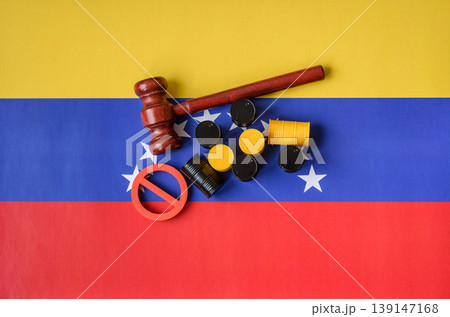 Barrels of oil, gas, or chemicals on the venezuelan flag and a ban sign. Barrels of venezuela oil 139147168