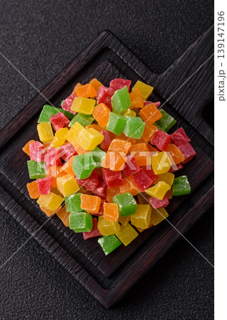 Candied fruit in colorful cubes as an ingredient for baked goods and sweets. Candied fruit 139147196