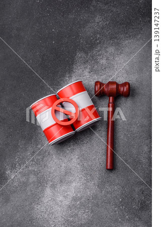 Metal barrels containing oil, gas, or chemicals, with a prohibition sign. Oil barrels 139147237