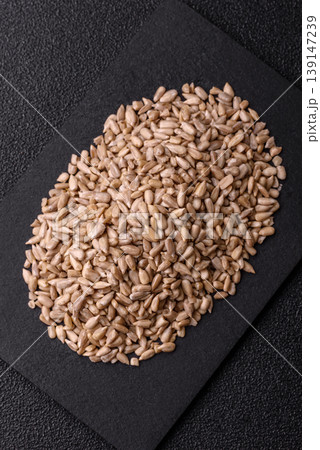 Shelled sunflower seed kernels, salted, roasted, or raw, are a healthy ingredient. Sunflower seeds Shelled sunflower seed kernels, salted, roasted, or raw, are a healthy ingredient. Sunflower seeds 139147239