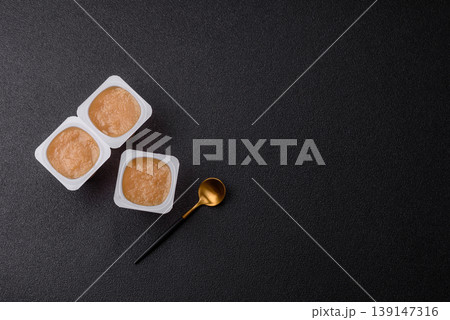 Apple sweet sauce, baby food, canned ingredient for desserts. Apple sauce 139147316