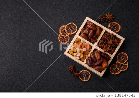 Dried dates on a ceramic plate for Ramadan or Iftar. Dates fruit as a background 139147343