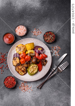 Grilled vegetables: bell peppers, zucchini, eggplant, onions, and corn. Grilled vegetables Grilled vegetables: bell peppers, zucchini, eggplant, onions, and corn. Grilled vegetables 139147373