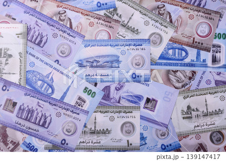 United Arab Emirates cash, dirhams and coins for exchange and financial transactions. UAE currency United Arab Emirates cash, dirhams and coins for exchange and financial transactions. UAE currency 139147417