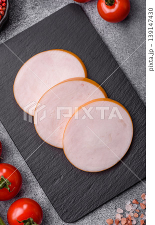 Chicken or Indian cooked sausage or ham sliced for breakfast sandwiches. Chicken sausage slices Chicken or Indian cooked sausage or ham sliced for breakfast sandwiches. Chicken sausage slices 139147430