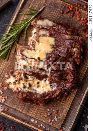 Steak, beef or pork meat grilled or barbecued with salt and spices. Beef steak 139147470