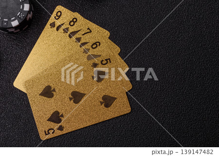 Playing cards and chips on a table, a gambling game of poker. Cards and chips 139147482