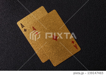 Playing cards and chips on a table, a gambling game of blackjack or baccarat. Cards and chips Playing cards and chips on a table, a gambling game of blackjack or baccarat. Cards and chips 139147483