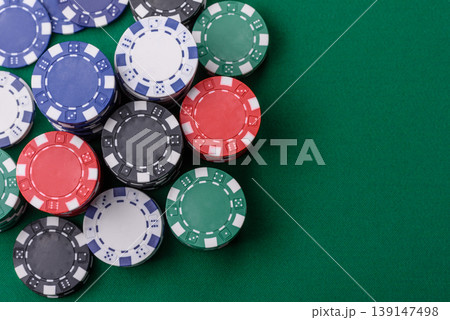 Multicolored casino chips as a conceptual backdrop for gambling games. Multicolored casino chips Multicolored casino chips as a conceptual backdrop for gambling games. Multicolored casino chips 139147498