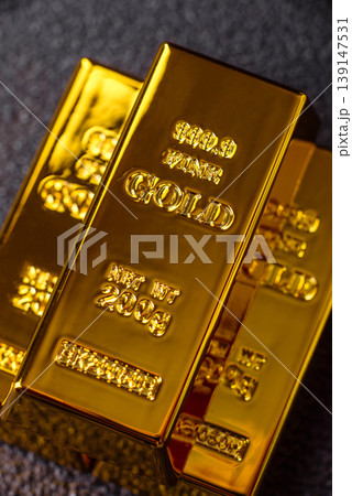 Gold bars or ingots as a metal for bank storage, investments, and financial transactions. Gold bars Gold bars or ingots as a metal for bank storage, investments, and financial transactions. Gold bars 139147531