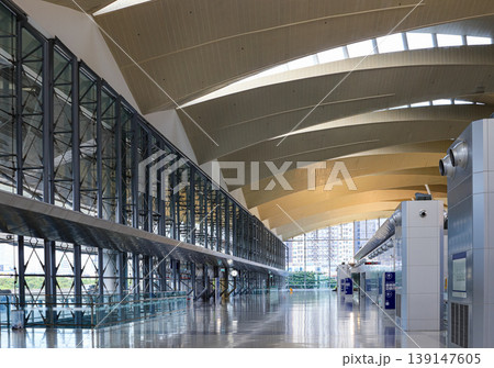 The Illuminated long and clean corridor of modern Transportation hub building. 139147605