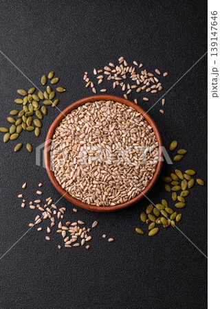 Shelled sunflower seed kernels, salted, roasted, or raw, are a healthy ingredient. Sunflower seeds Shelled sunflower seed kernels, salted, roasted, or raw, are a healthy ingredient. Sunflower seeds 139147646