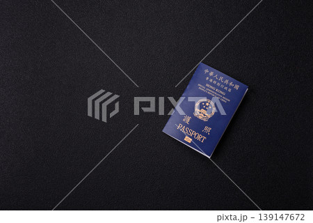 A Hong Kong passport, a document for travel, leisure, and work. A Hong Kong passport A Hong Kong passport, a document for travel, leisure, and work. A Hong Kong passport 139147672