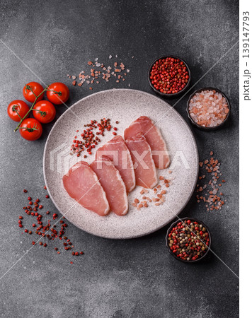 Smoked or dry cured meat slices, pork or ham with salt and spices. Smoked meat slices 139147793