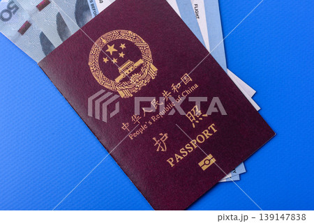 China, Chinese passport with money and flight tickets. Chinese passport China, Chinese passport with money and flight tickets. Chinese passport 139147838