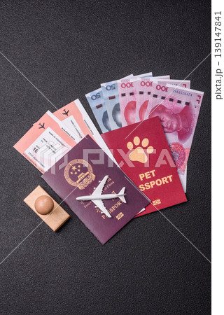 China, Chinese passport with money and flight tickets. Chinese passport China, Chinese passport with money and flight tickets. Chinese passport 139147841