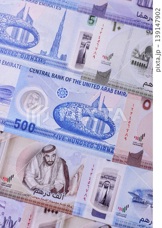 United Arab Emirates cash, dirhams and coins for exchange and financial transactions. UAE currency United Arab Emirates cash, dirhams and coins for exchange and financial transactions. UAE currency 139147902
