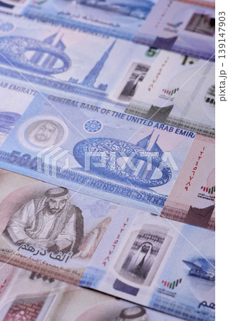 United Arab Emirates cash, dirhams and coins for exchange and financial transactions. UAE currency United Arab Emirates cash, dirhams and coins for exchange and financial transactions. UAE currency 139147903