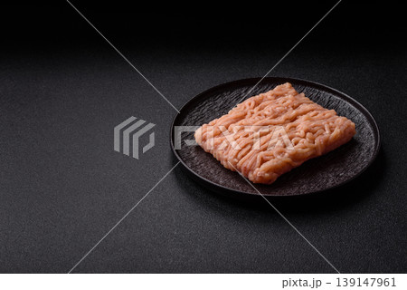 Raw fresh ground chicken, turkey, or pork for burgers or meatballs. Raw ground chicken Raw fresh ground chicken, turkey, or pork for burgers or meatballs. Raw ground chicken 139147961